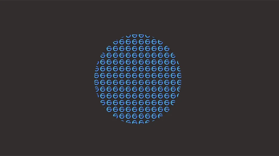 A circle of small spark marks on dark grey